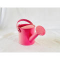 Pink metal kids watering can